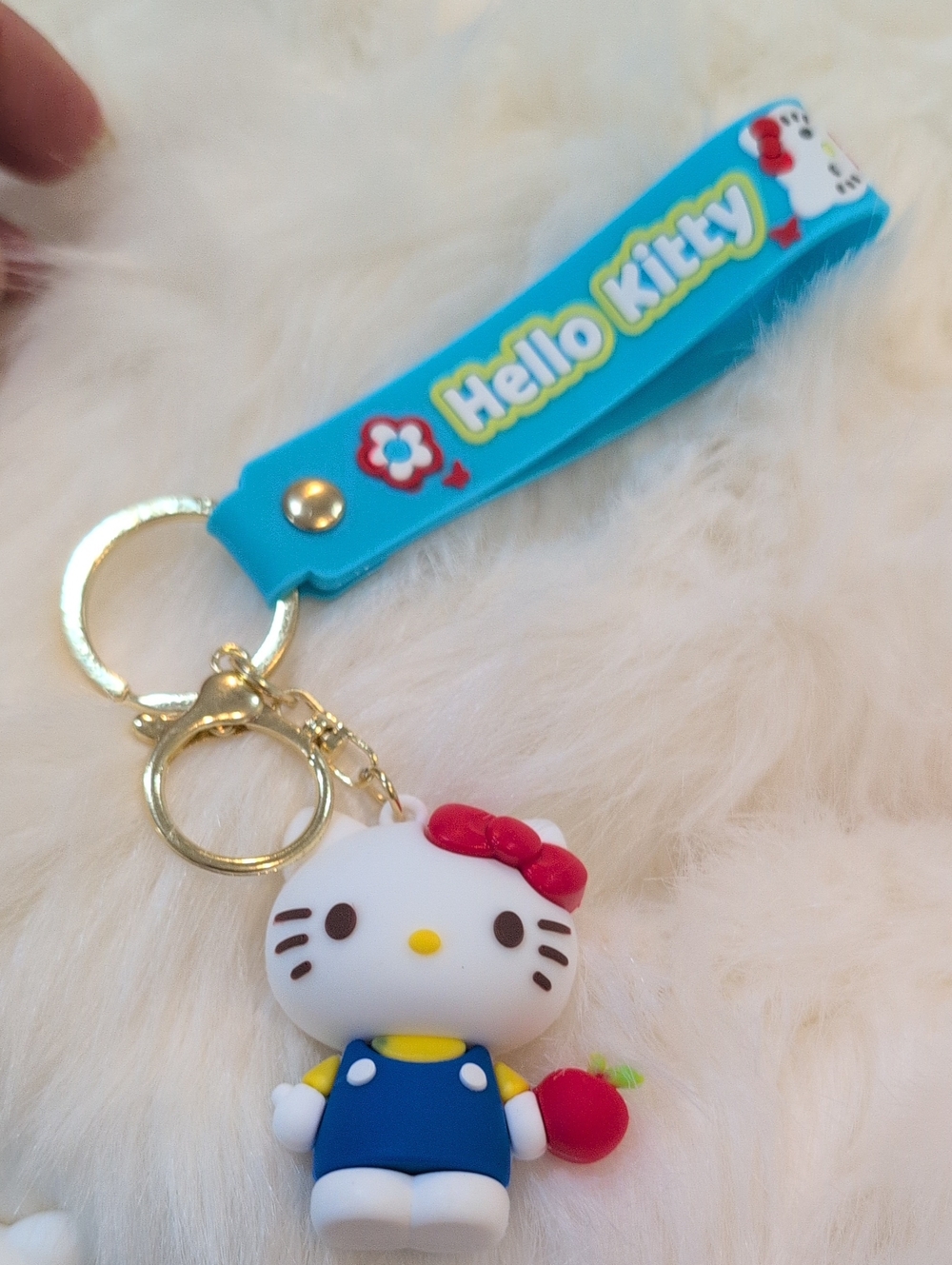 Hello Kitty Blue Strap Keychain with Red Bow Charm